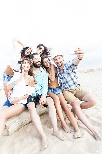 istock Playful selfie with friends on the beach 538570324