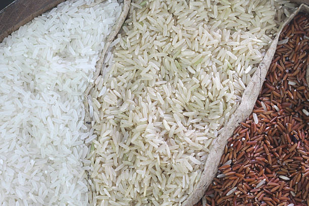 istock close up organic rice in sack bag 538570429