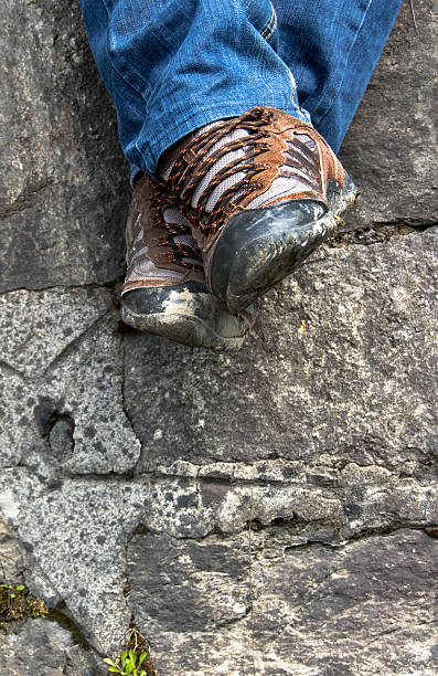 istock hiking shoes and stone 538572686