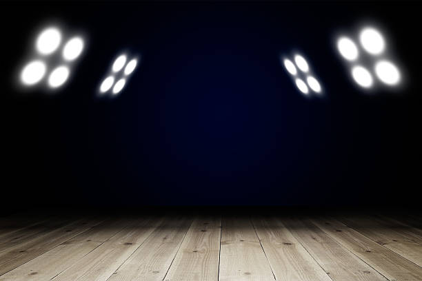istock Light in dark room with wooden floor 538573310