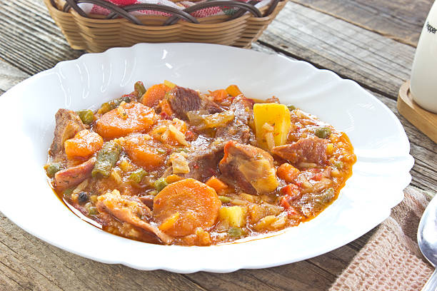 istock Pork meat stew with vegetables in plate 538574350