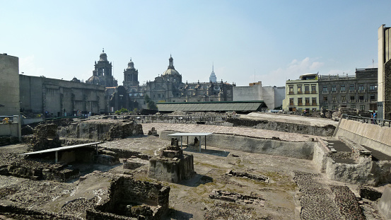 Mexico City, D.F, Mexico - January 05, 2013: Ruins of the Templo Mayor (Great Temple), one of the main temples of the Aztecs in their capital city of Tenochtitlan. Sorrounded by buildings, located in the Zócalo Square and is part of a UNESCO World Heritage Site in Mexico City.