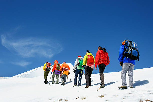 istock Group climbers goes down from the top of Erciyes volcano. 538575590