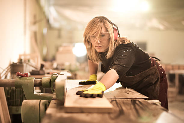 istock Blonde woman working with plank 538575934