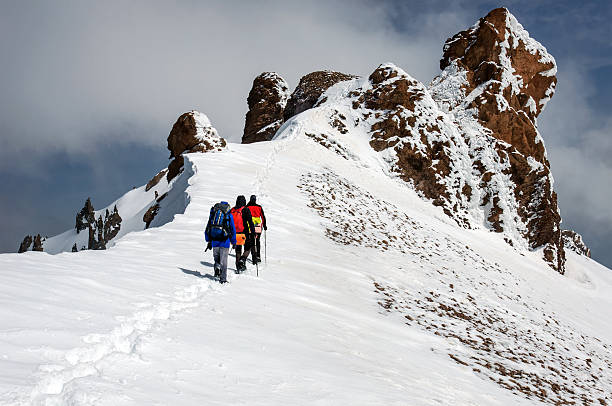 istock Group climbers goes down from the top of Erciyes volcano. 538577738