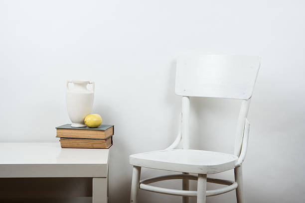 istock chair and empty wall background, interior art poster mock up 538578762