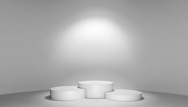 istock Spotlight illuminate podium with steps in room 538579172