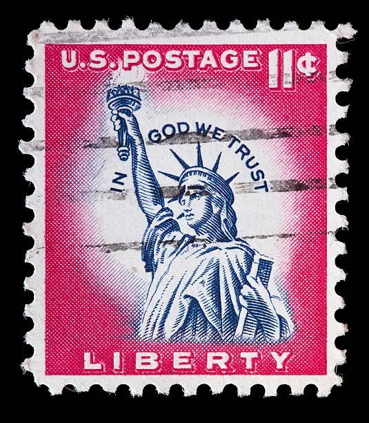 Photo of United States used postage stamp showing the Statue of Liberty