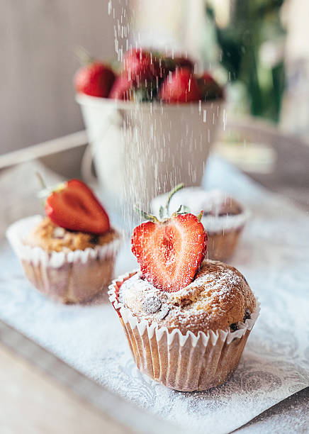 istock Cupcake with fresh stawberry powder with sugar 538583724