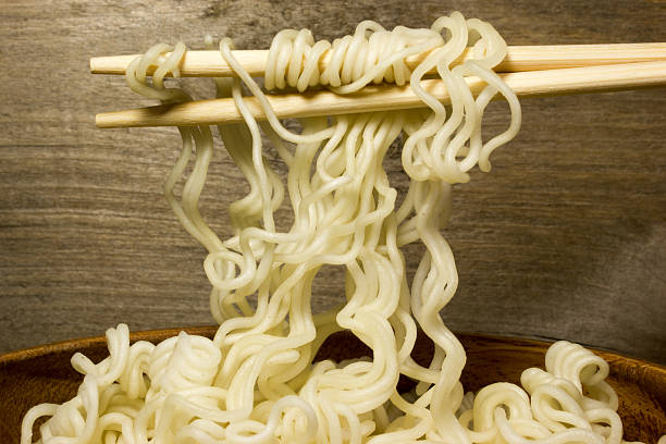 istock Instant noodles in a wooden bowl with chopsticks 538586068