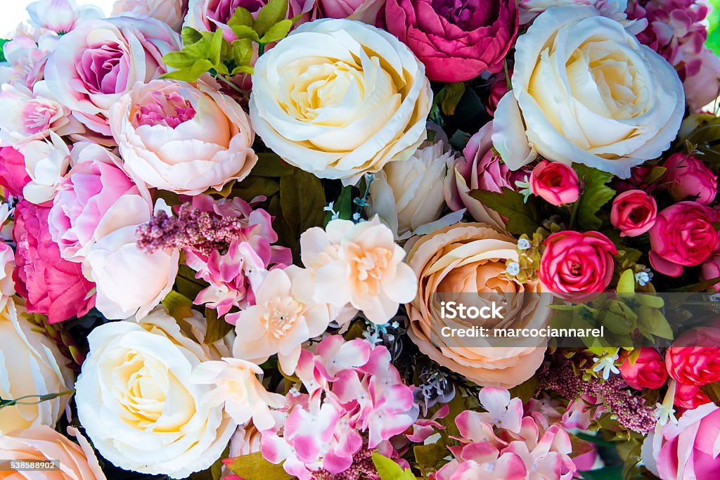 Artificia Floral background Floral background. artificial flowers in a colorful composition Flower Stock Photo