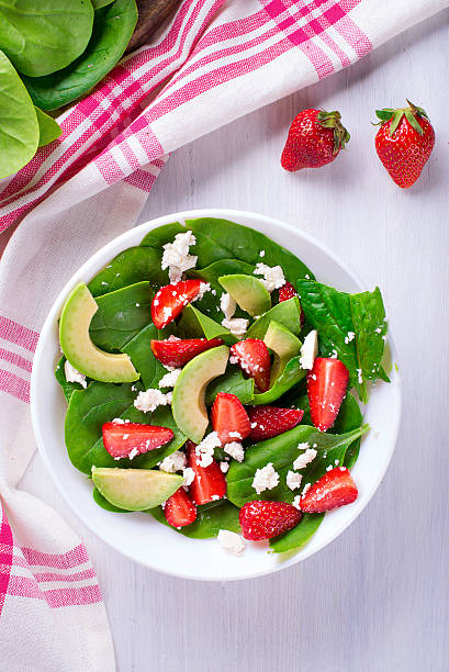 istock Summer salad with strawberry, avocado and spinach 538588930