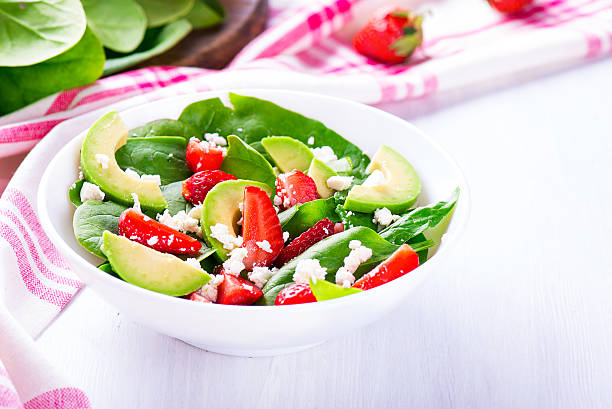 istock Summer salad with strawberry, avocado and spinach 538589042