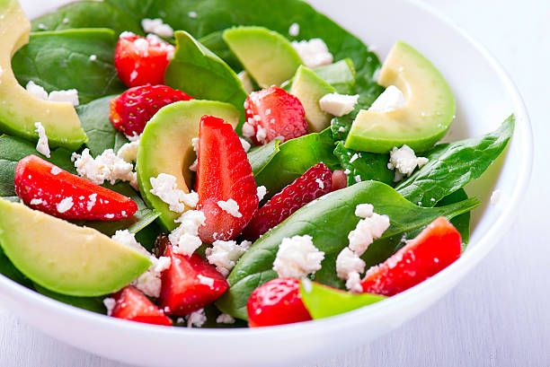 istock Summer salad with strawberry, avocado and spinach 538589160