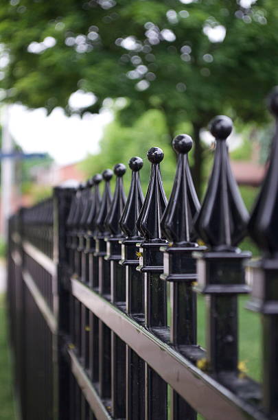 istock Black metal fence 538589602