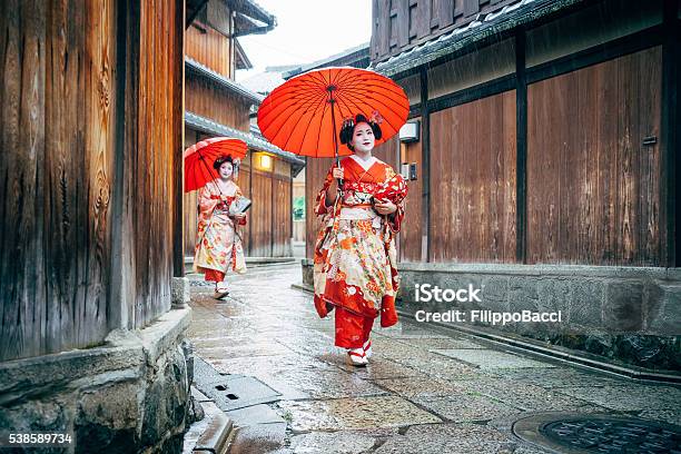 Maiko Women Walking In Kyoto Stock Photo - Download Image Now - Japan, Kyoto City, Kyoto Prefecture
