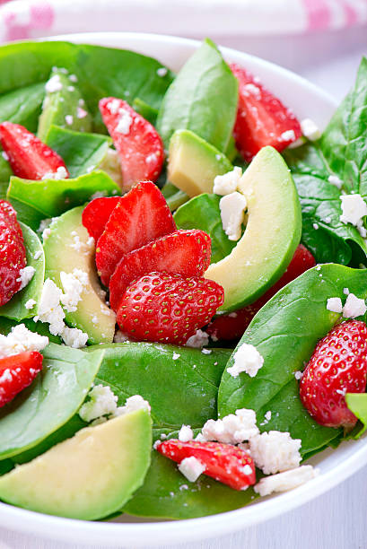 istock Summer salad with strawberry, avocado and spinach 538589764