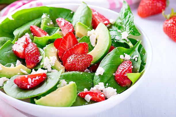 Summer salad with strawberry, avocado and spinach