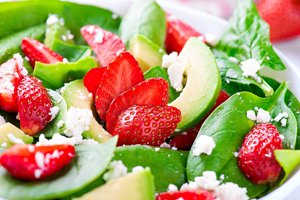 istock Summer salad with strawberry, avocado and spinach 538589960