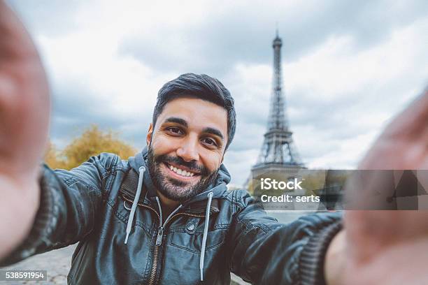 Young Man Taking Selfie With Smartphone Stock Photo - Download Image Now - Selfie, Paris - France, Tourist