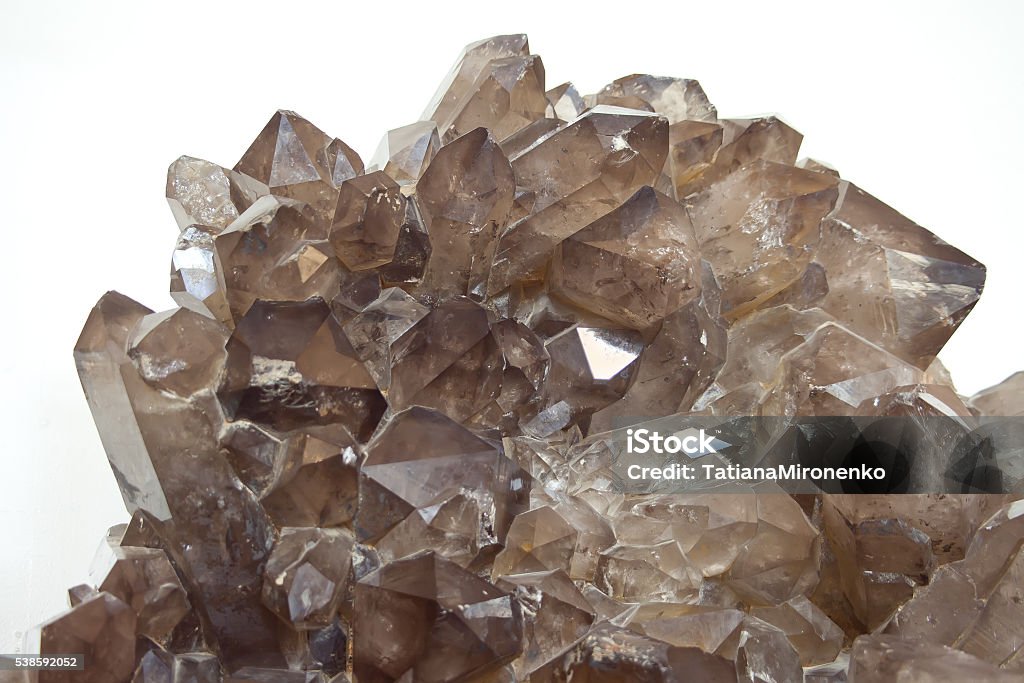 Smokey quartz crystals Cluster of smokey quartz crystals  on white. Close up Quartz Stock Photo