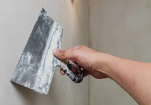 palette-knife in hand isolated on a white background