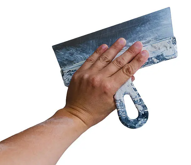 palette-knife in hand isolated on a white background