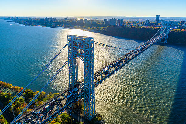 George Washington Bridge, NYC, rush hour, view from helicopter, silhouette George Washington Bridge, NYC, rush hour, view from helicopter, silhouette hudson river stock pictures, royalty-free photos & images