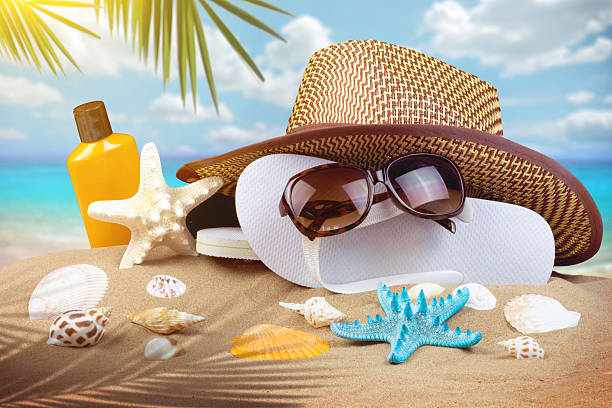 istock Summer background with starfish and accessories on sand beach 538595062