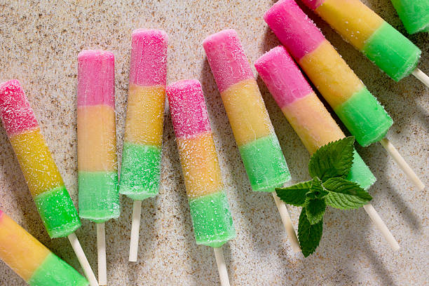 Delicious fruit ice traffic light with cherry, orange and apple