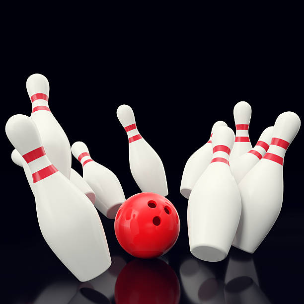 istock Bowling game with red ball crashing into the skittles. on 538595750