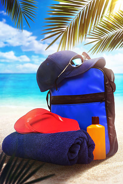 istock Summer background with starfish and accessories on sand beach 538596478
