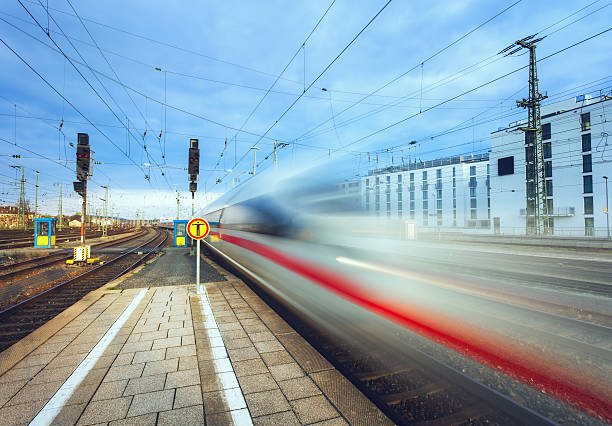 istock High speed passenger train on tracks in motion 538597186