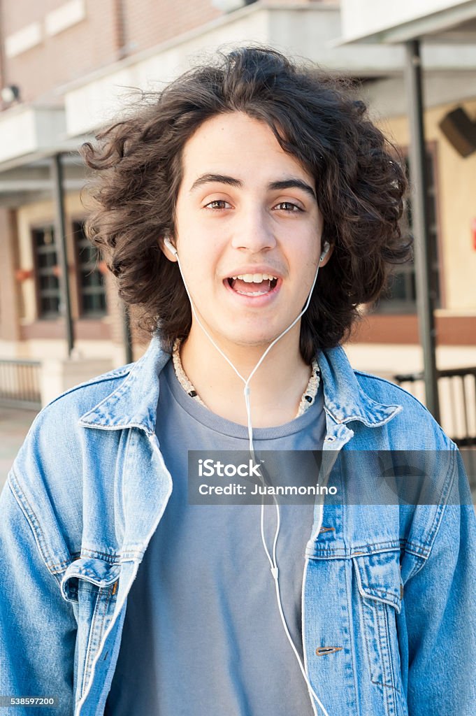 Teenager Smiling Stock Photo - Download Image Now - Long Hair, Teenage Boys,  Cool Attitude - iStock