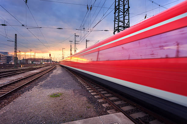 istock High speed passenger train on railroad track in motion 538597482