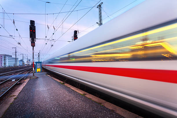 istock High speed passenger train on railroad track in motion 538597550