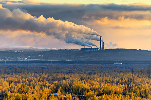 istock Smokestack smokestacks that pollute the atmosphere. Ecological catastrophy. 538599100