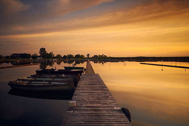 istock Boats in the harbor at sunset 538599500