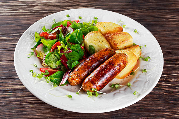Roasted Sausages with Chips and Mix Vegetable salad.