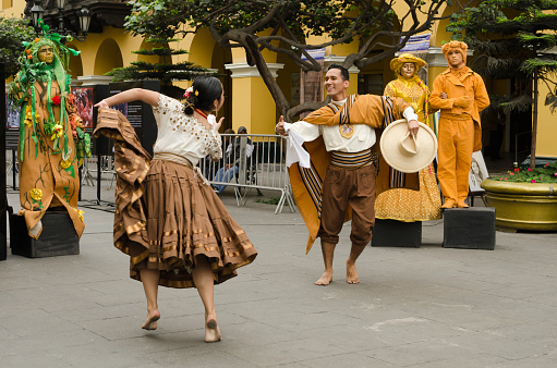 Lima, Peru- September 24, 2015: Couple of peruvian dancers performs traditional courting dance 