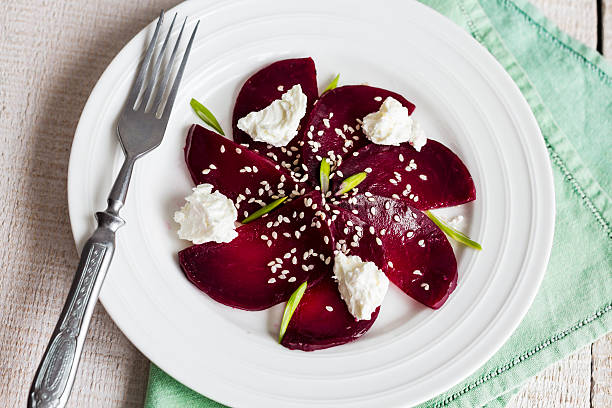 istock roasted beet salad with goat cheese and sesame seeds, snack 538614333