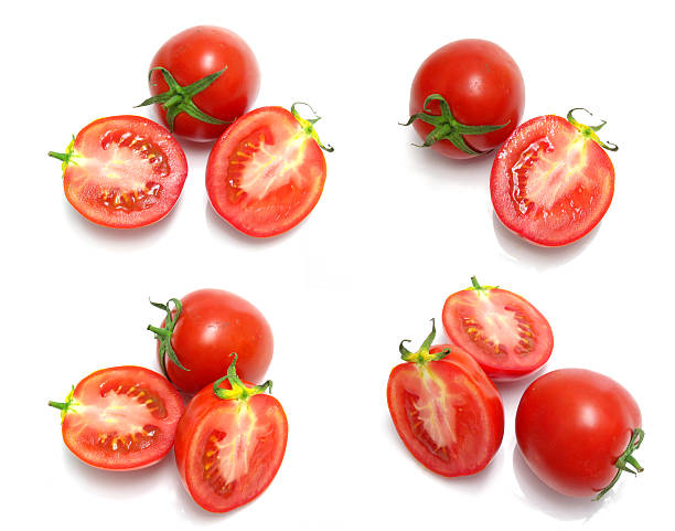 istock tomato and slices of tomato on white background 538614841