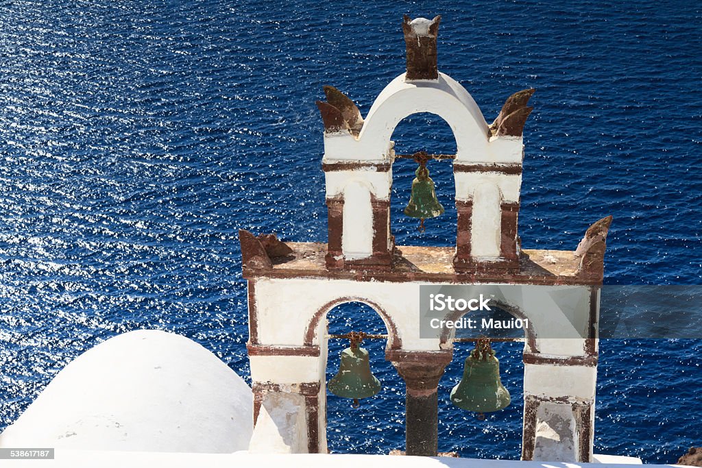 Ancient bell tower over the blue sea Ancient bell tower over the blue sea, Santorini, Cyclades, Greece 2015 Stock Photo