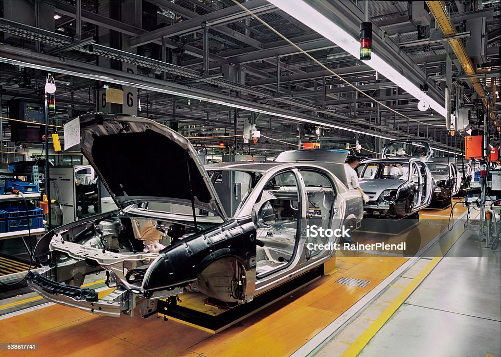 car production line car production line with unfinished cars in a row Car Stock Photo