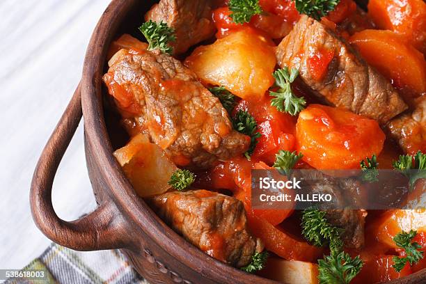 Stew With Tomato Sauce And Vegetables Macro Top View Stock Photo - Download Image Now