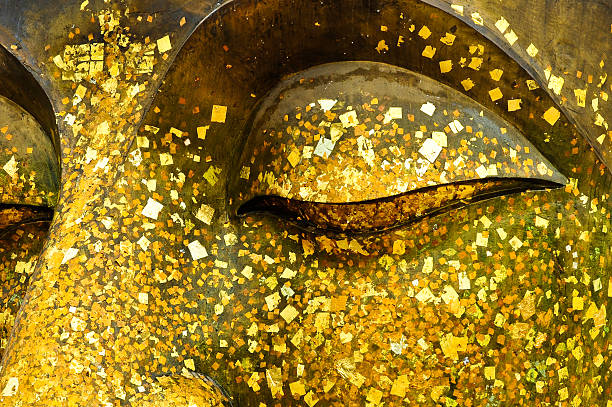 istock The eye of bronze Buddha. 538619401
