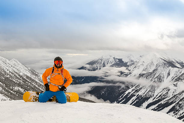 istock Backcountry Snowboarder on Mountain Summit 538620563
