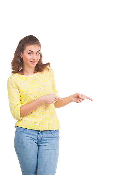 istock Young woman pointing at something 538621741