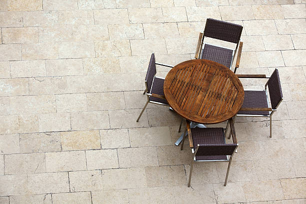 istock Outdoor summer cafe tables with chairs 538621935
