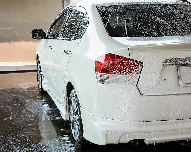 car getting a wash with soap, car washing